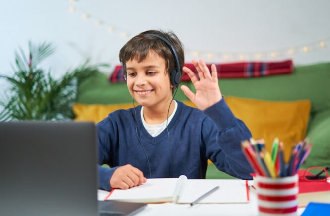 A child participates in handwriting, phonics, and spoken English lessons in online classes for kids